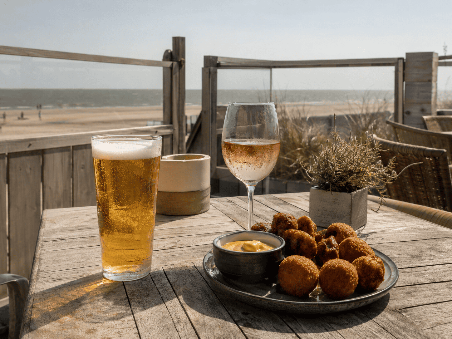 Beach bar prices vary sharply across South Holland in 2026, with beer from €3.20 to €5 and a Hoek van Holland beer costing €4.50.